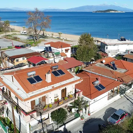 Sunrise - Luxury Beachfront Escape Olympiada